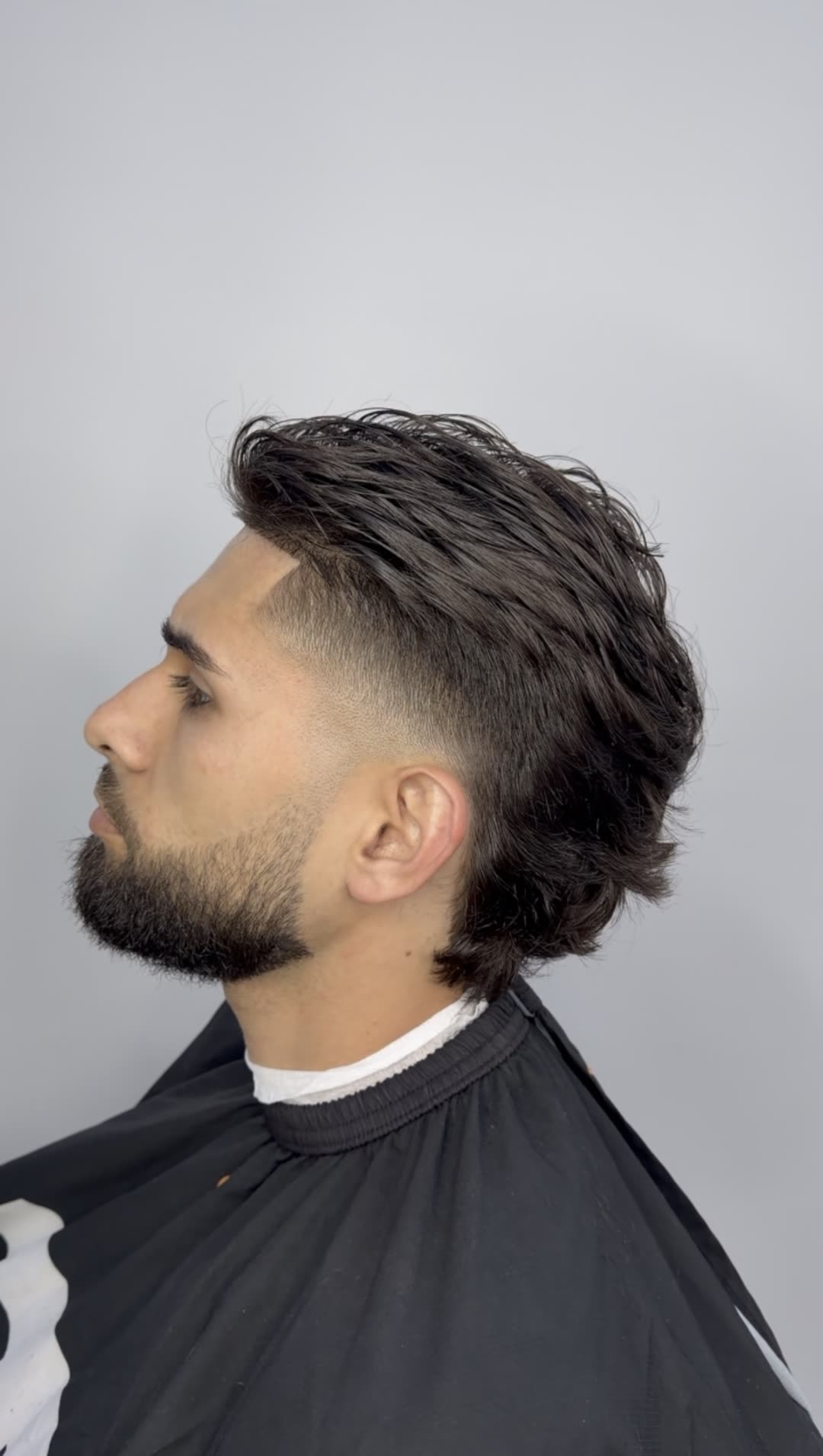 Fade + beard by Twisty Rico